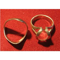 814. Two fru-fru New Age design silver rings, both marked 925