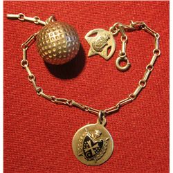 815. Vintage, way cool watch chain with two crests and a golf ball charm, rock this on your next day