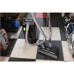 #7 WHISPERTONE 12 AMP VACUUM