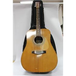 TARA ACOUSTIC GUITAR IN A LEVY'S LEATHER LTD. CASE