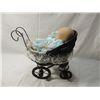 Image 2 : SMALL BABY DOLL IN WOODEN AND WICKER CARRIAGE