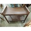 Image 1 : VINTAGE MOVEABLE TV STAND ON WHEELS