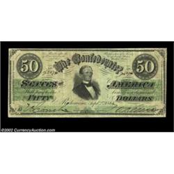 T16 $50 1861. A broadly margined, well-centered early type note with excellent eye appeal. There are