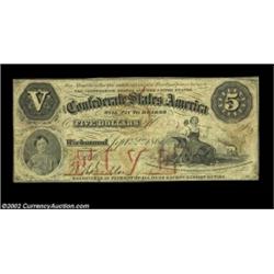 T32 $5 1861. This attractive two-toned orange and black note, printed by the firm Leggett, Keatinge.