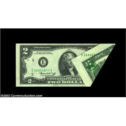 Fr. 1935-E $ 1976 Federal Reserve Note. Choice Crisp Uncirculated.This impressive printed fold shows