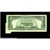 Image 2 : Fr. 1974-C $5 1977 Federal Reserve Note. About Uncirculated.A nice foldover error that is missing th