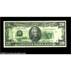 Fr. 2073-G $20 1981 Federal Reserve Note. About Uncirculated.A nice back-to-front offset covers the.