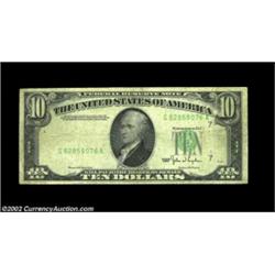 Fr. 2010-G $10 1950 Federal Reserve Note. Very Fine.Most of the black portion of the overprint is mi