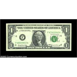 Fr. 1903-F $1 1969 Federal Reserve Note. About Uncirculated. Mismatched serial numbers F68925940A/F6