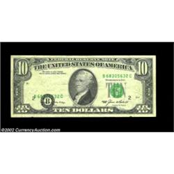 Fr. 2027-B $10 1985 Federal Reserve Note. Very Fine.The black portion of the overprint is shifted wa