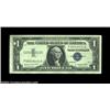 Image 1 : Fr. 1620 $1 1957A Silver Certificate. Choice About Uncirculated.A small solvent drop has affected th