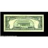 Image 2 : Fr. 1975-G $5 1977A Federal Reserve Note. Very Fine.This boldly doubled face printing must have circ