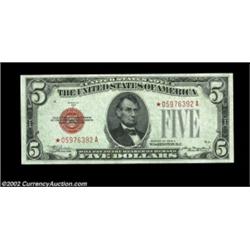 Fr. 1528* $5 1928C Legal Tender. Choice-Gem Crisp Uncirculated.This pristine, boldly embossed note i