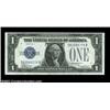 Image 1 : Fr. 1604 $1 1928D Silver Certificate. Choice Crisp Uncirculated.Gem but for a very tight top margin.