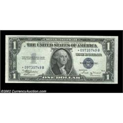 Fr. 1611* $1 1935B Silver Certificate. Gem Crisp Uncirculated.A well centered beauty. Important noti