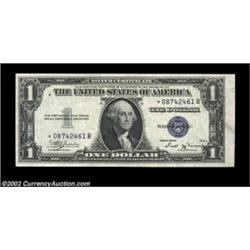 Fr. 1611* $1 1935B Silver Certificate. Choice Crisp Uncirculated.This is centered so poorly, particu