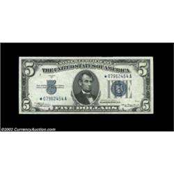 Fr. 1651* $5 1934A Silver Certificate. Gem Crisp Uncirculated.A nice well centered star example. Imp