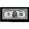 Image 1 : Fr. 1653 $5 1934C Mule Silver Certificate. Gem Crisp Uncirculated.The scarce M-A mule block with bac