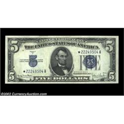 Fr. 1654* $5 1934D Wide II Silver Certificate. Gem Crisp Uncirculated.A pristine example from a litt