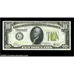 Fr. 2003-G $10 1928C Federal Reserve Note. About Uncirculated.Bright and fresh, just a light fold fr