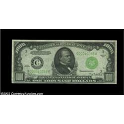 Fr. 2212-C $1,000 1934A Federal Reserve Note. CGA About Uncirculated 58.A light center bend is visib