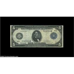 Fr. 858* $5 1914 Federal Reserve Star Note Fine. The paper on this circulated star note is soft and.