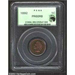 1892 1C PR66 Red and Brown PCGS. Wisps of ruby-red patina penetrate the otherwise olive-gold color..