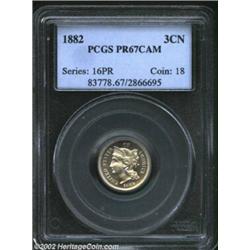 1882 3CN PR67 Cameo PCGS. Faintly variegated golden-brown patina graces the surfaces of this well st