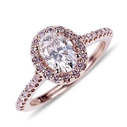 APP: 34.2k *14 kt. Gold, 1.08CT Oval Cut Diamond And 0.33CT Fancy Pink Diamond Ring