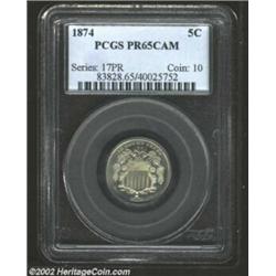 1874 5C PR65 Cameo PCGS. The strike is bold with evidence of heavy die polishing, there is clear def