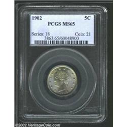 1902 5C MS65 PCGS. A nicely struck and flashy Gem that has tremendous eye appeal due to its vivid pa