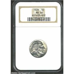 1928 5C MS66 NGC. Milky, light blue toning covers the highly lustrous surfaces of this well-struck a