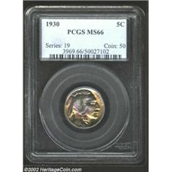 1930 5C MS66 PCGS. Blazing luster dances about the devices. The hints of blue amidst golden toning d