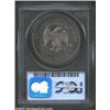 Image 2 : 1879 T$1 PR65 PCGS. This Gem quality survivor is deeply toned in charcoal-gray shades with blushes o