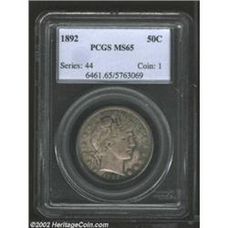 1892 50C MS65 PCGS. This crisp, original Gem is awash with attractive gun-metal gray and blue toning