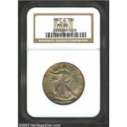 1947-D 50C MS66 NGC. Bright swirls of yellow-green, golden-brown, and lilac patina enrich each side.