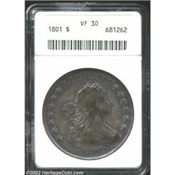 1801 S$1 VF30 PCGS. B-1, BB-211. This coin displays moderate, generally evenly distributed wear on b