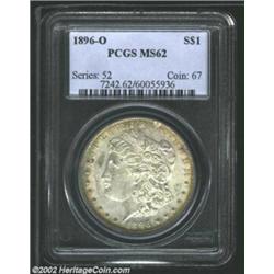 1896-O S$1 MS62 PCGS. The borders have dusky golden-brown and steel-blue patina. A well struck speci