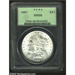 1897 S$1 MS66 PCGS. Boldly struck and exquisitely preserved, the fully brilliant surfaces display sp