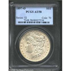 1897-O S$1 AU58 PCGS. A tinge of metallic-gray is noted as a result of minimal wear. Most of the ori