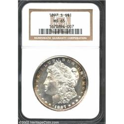 1897-S S$1 MS65 NGC. Frosty devices and nicely reflective fields contrast well with the vibrant colo