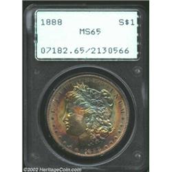 1888 S$1 MS65 PCGS. Rose-violet, golden-brown, and sea-green patina dominates the obverse, while the