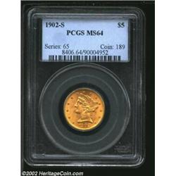 1902-S $5 MS64 PCGS. A flashy near-Gem that has lovely blushes of peach patina. The surfaces are imp