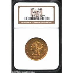 1851 $10 AU55 NGC. Lightly worn on the highest points with some luster remaining. The fields are oli