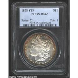 1878 8TF S$1 MS65 PCGS. Bright cartwheel luster rolls around each side with a ring of deep golden-br