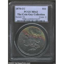 1878-CC S$1 MS62 PCGS. The obverse exhibits deep charcoal coloration that breaks at the top to revea