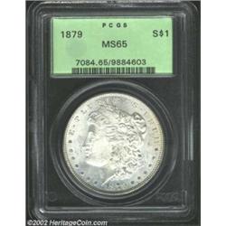 1879 S$1 MS65 PCGS. Incredibly frosty with hints of blue over clean, white surfaces.From the Memphis