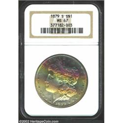 1879-S S$1 MS67 NGC. Rainbow colored bag toning on the obverse is easily the most visually impressiv