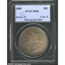 1880 S$1 MS66 PCGS. Deep golden-brown, russet, pewter-gray, and iridescent violet toning covers the.