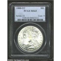 1880-CC S$1 MS65 PCGS. Immaculate surface preservation with snowy white surfaces and wonderful luste